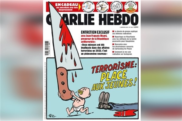Macron, Charlie Hebdo saldırısında hayatını kaybedenleri andı